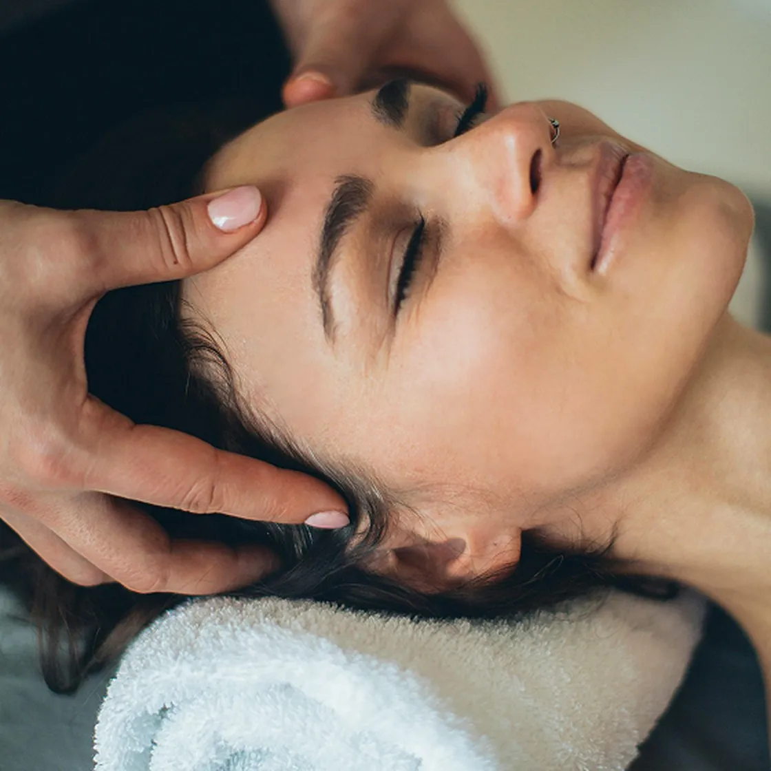 Close-up of a head spa scalp massage treatment