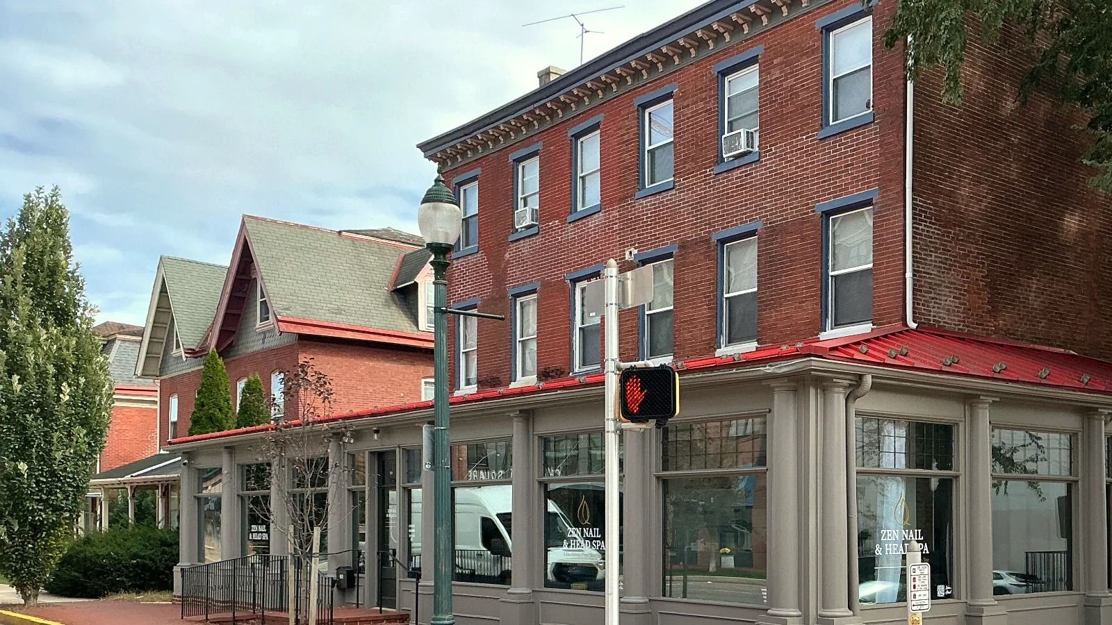 Exterior of Zen Nail & Head Spa in downtown West Chester.